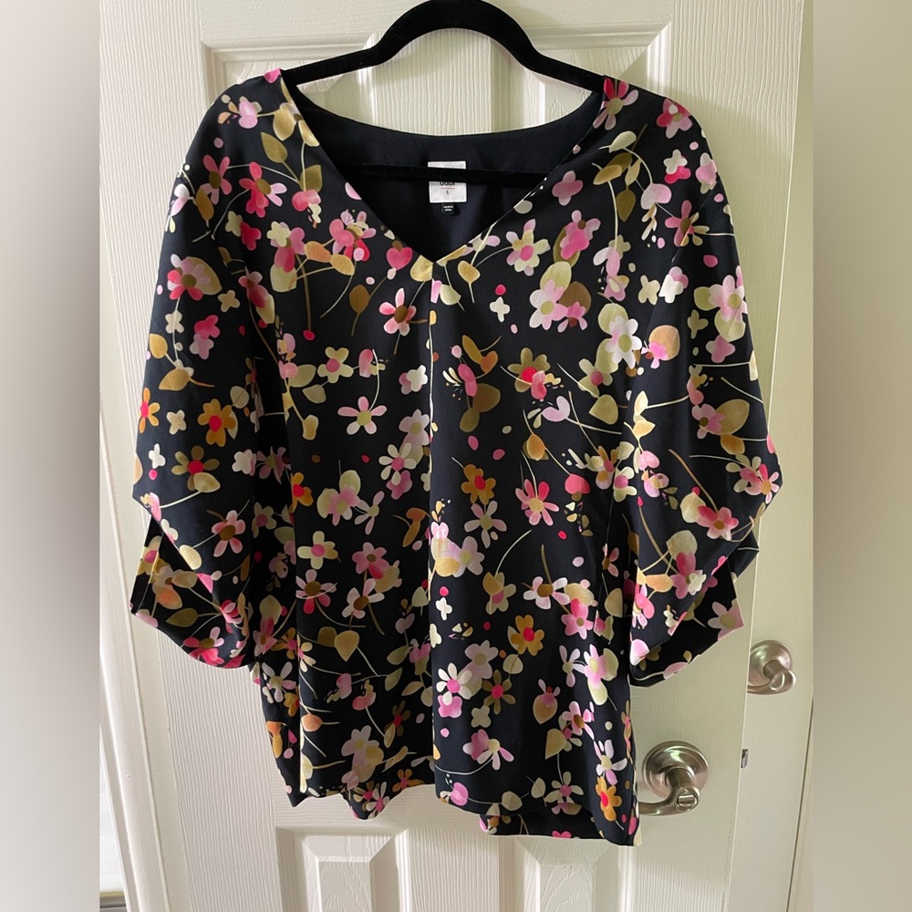 Elegant black floral CAbi blouse in size large.